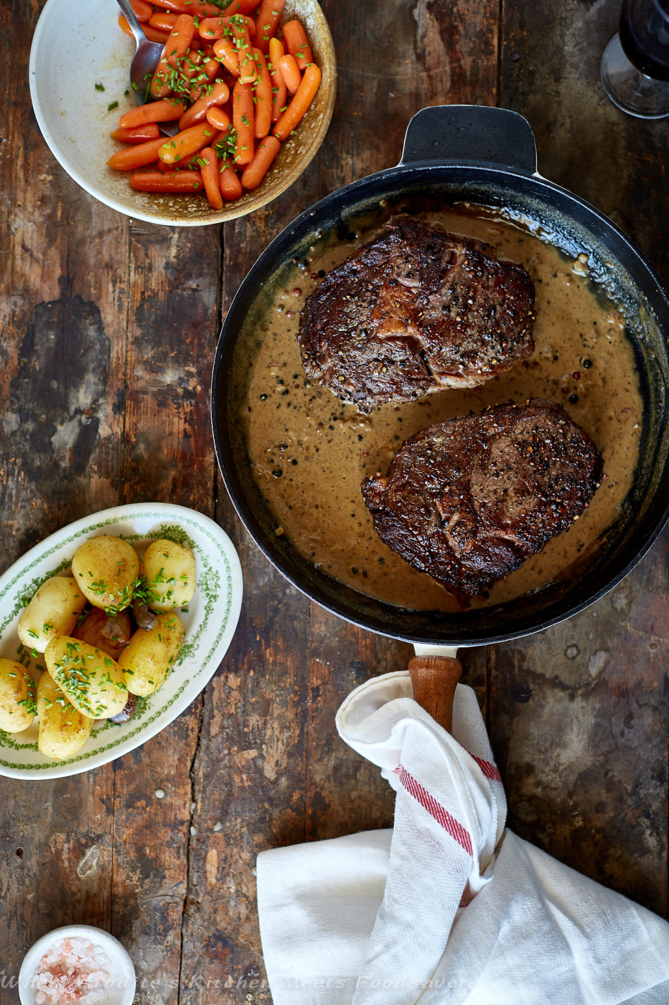 Classic Rib Eye Steaks With Peppercorn Sauce, Parisian Potatoes and HoneyGlazed Carrots